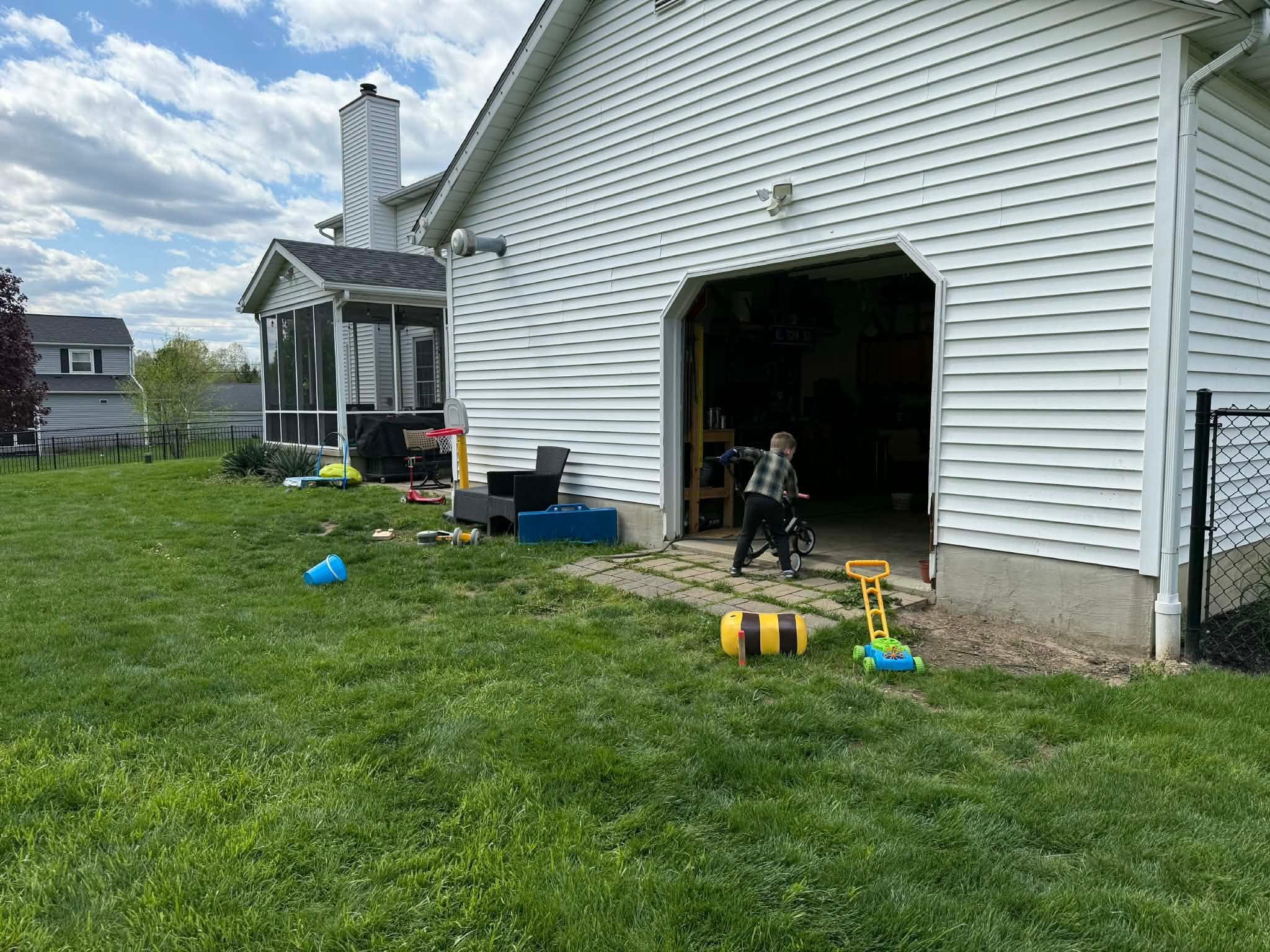 Exterior side-yard concrete project and site prep at a Northeast Ohio residence